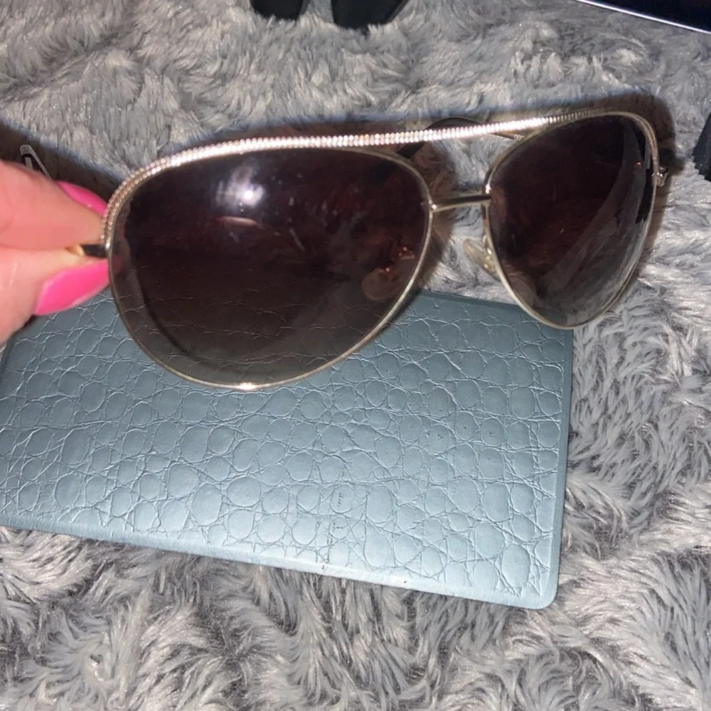 Gold rimmed sunglasses 🕶️